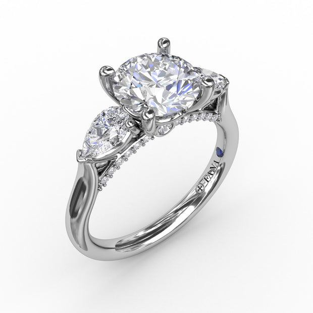 Classic Three-Stone Engagement Ring With Pear-Shape Side Diamonds