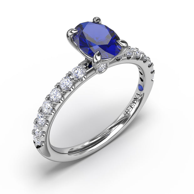 Striking Solitaire Sapphire And Diamond Ring
