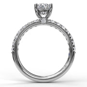 Oval Cut Solitaire With French Cut Pave