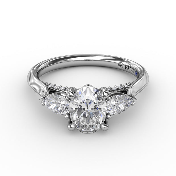 Classic Oval Three-Stone Diamond Engagement Ring With Pear-Shape Side Diamonds