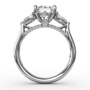 Classic Three-Stone Engagement Ring With Pear-Shape Side Diamonds