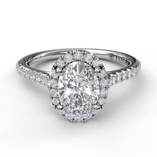 Delicate Oval Shaped Halo And Pave Band Engagement Ring