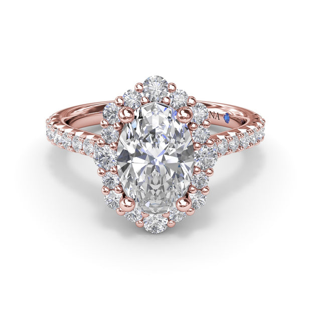 Oval Diamond Graduated Halo Engagement Ring